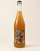 Intellectuel Pétillant Naturel wine bottle, front label, warm cream studio background